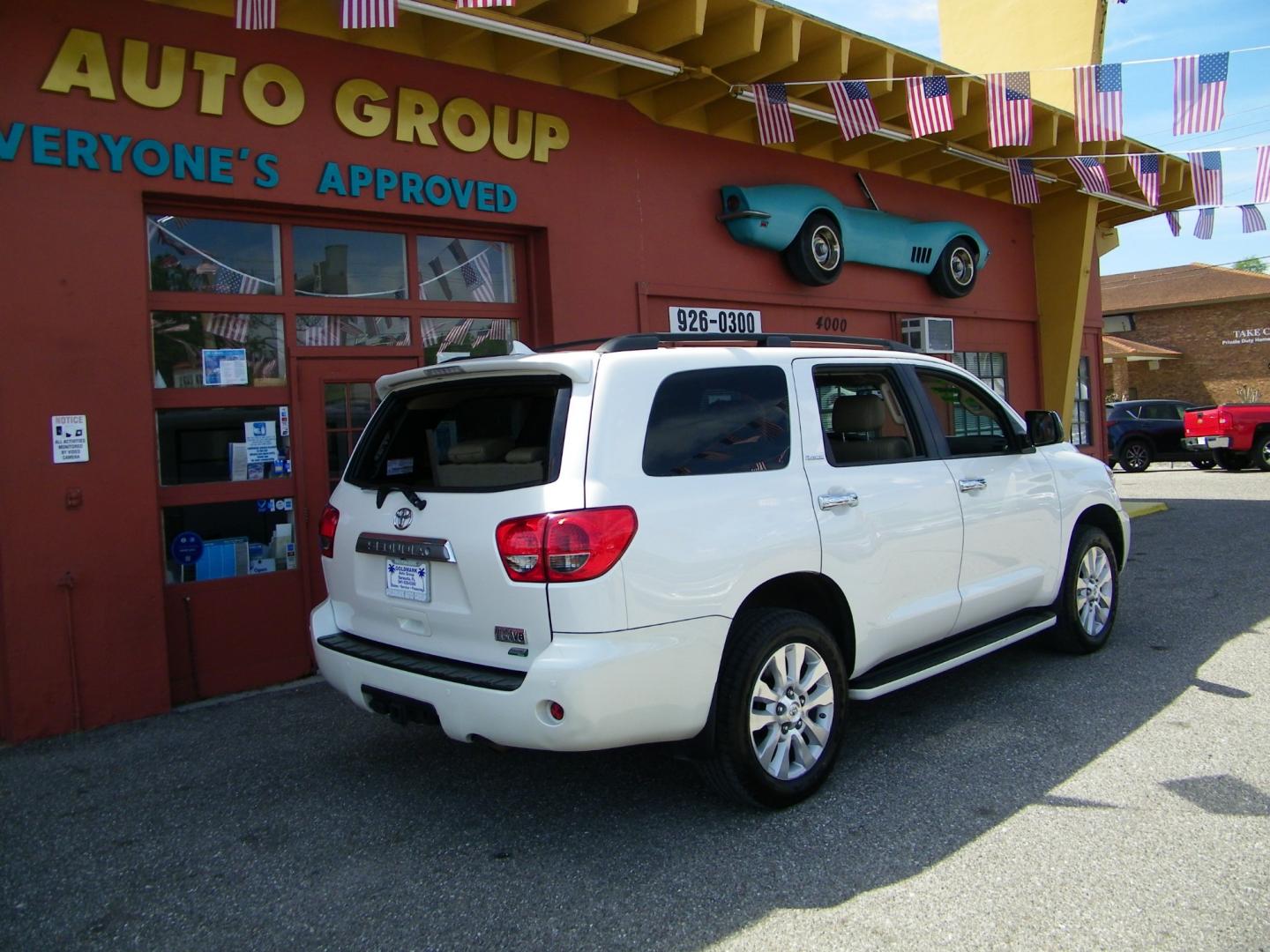 2015 White /Brown Toyota Sequoia Plantium 4WD FFV (5TDDW5G19FS) with an 5.7L V8 DOHC 32V FFV engine, 6-Speed Automatic transmission, located at 4000 Bee Ridge Road, Sarasota, FL, 34233, (941) 926-0300, 27.298664, -82.489151 - Photo#2